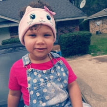 A child wearing CozyPhones